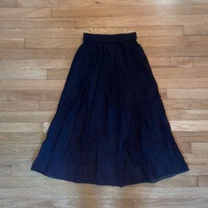 Black Midi SkirtH&M black midi skirt with elastic waist. Semi-sheer outer layer,